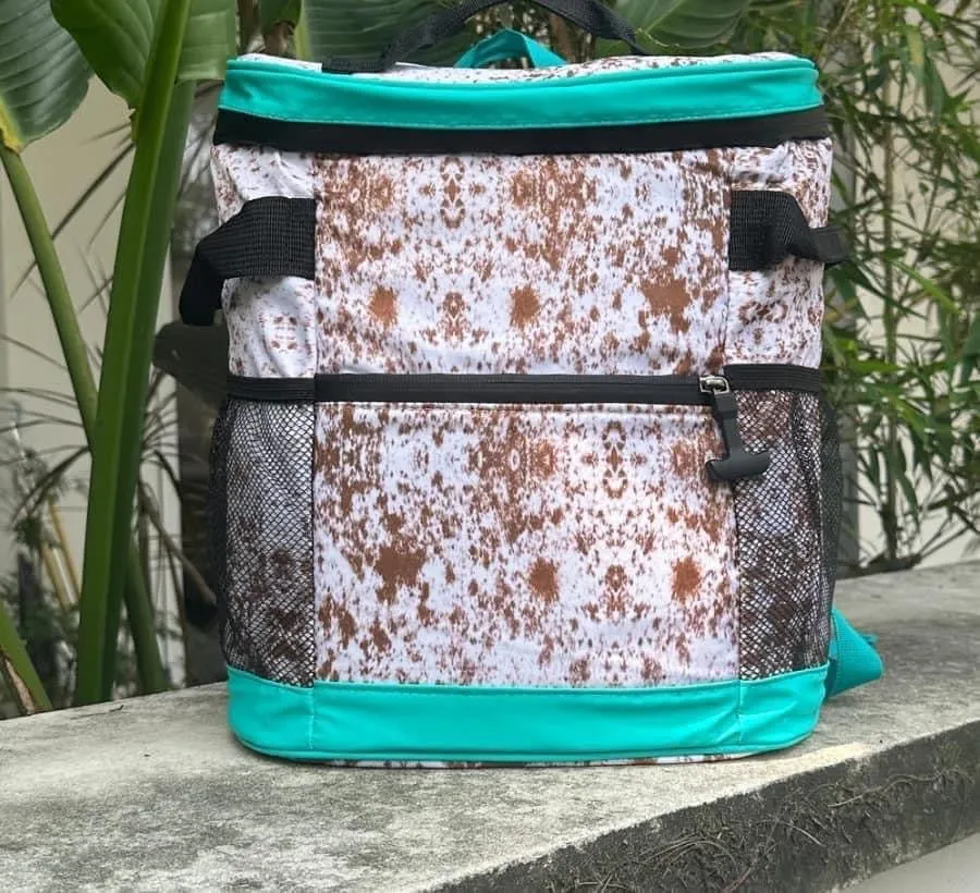 COW PRINT WITH TEAL TRIM COOLERS