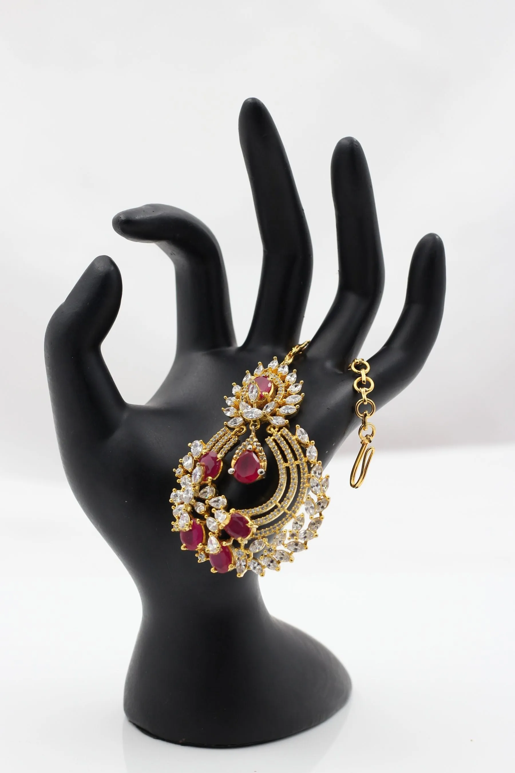 Regal Gold-Polished American Diamond Tikka with Pink & White Stones